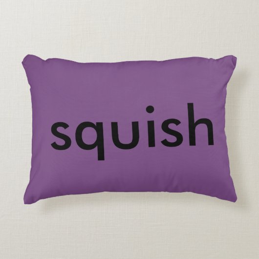 、"これあります枕"が紫色の枕"押しつぶして下さい" アクセントクッション (正面)