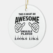 これはなんと素晴らしいウクレレプレーヤーのように見えるかです セラミックオーナメント (左)