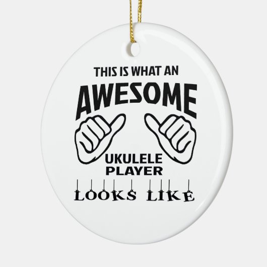 これはなんと素晴らしいウクレレプレーヤーのように見えるかです セラミックオーナメント (左)