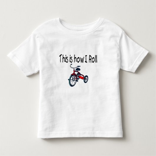 これは私がいかに転がるかです(赤い三輪車) トドラーTシャツ (正面)