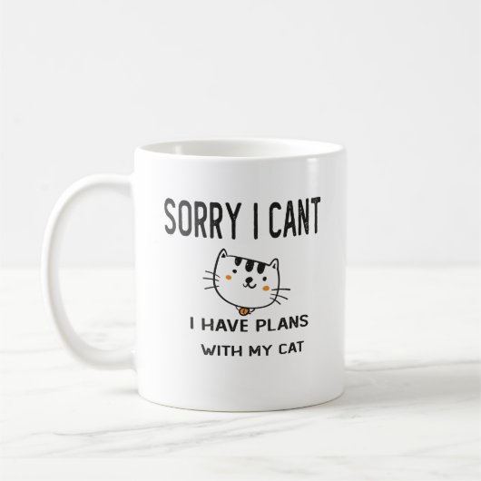 ごめんね猫と予定が入ってない コーヒーマグカップ (左)