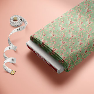 さくらんぼがピンクとティール（緑がかった色）に咲く ファブリック