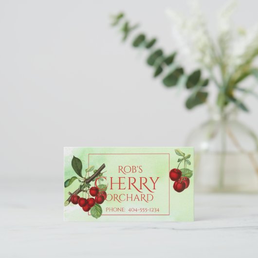 さくらんぼが緑の名刺に収まる 名刺 (スタンド正面)