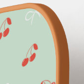 さくらんぼとボウライトグリーンのピックボールパドル ピックルボールラケット (左詳細)