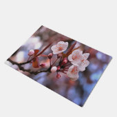 さくらんぼの花房とピンクとブルー ドアマット (アングル)
