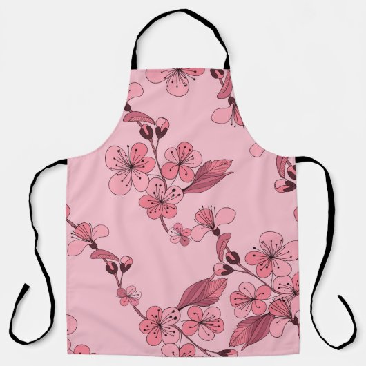 さくらんぼは白い背景にピンク色の花を咲かせる。 エプロン (正面)