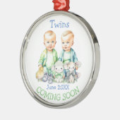 すぐに双子来の発表になる メタルオーナメント (左)