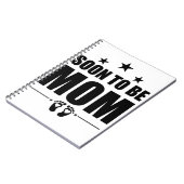 すぐに母親になる妊娠の発表は、母親を明らかにする ノートブック (左側)