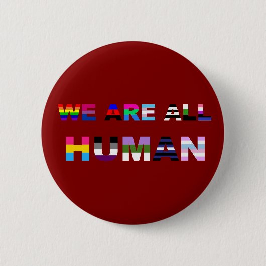 すべての人間の赤 缶バッジ (正面)