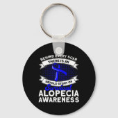 すべての傷跡の後ろに語らない物語のサポートAlopecia Aw キーホルダー (裏面)