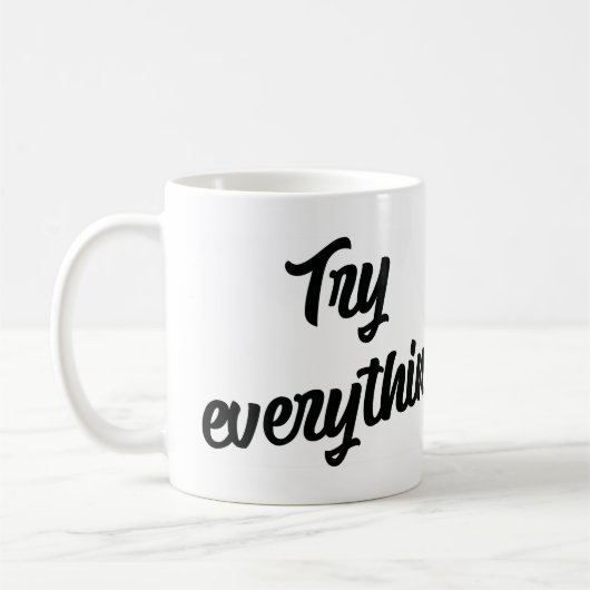 すべて試す コーヒーマグカップ (左)