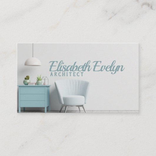 そのインテリアは空の白い壁に肘掛け椅子を持っている 名刺 (正面)