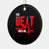 そのビートはハート手術の生存者の心拍に続く セラミックオーナメント (左)