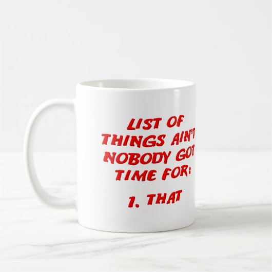 そのリストなんて見てる暇ないわ Funny Mug コーヒーマグカップ (左)