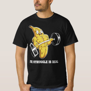 その戦いは実在バナおもしろいナを持ち上げる Tシャツ