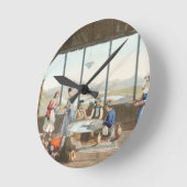 その画家のためにデルフィで開かれたディナー ラウンド壁時計 (傾斜)