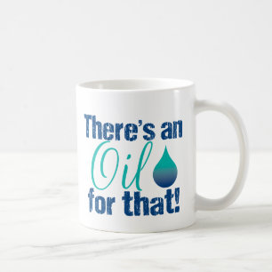 その青いティール(緑がかった色)のための油があります コーヒーマグカップ