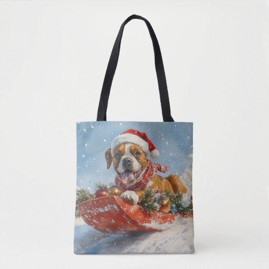 そりで楽しむボクサー犬 雪を降らせて クリスマス トートバッグ (正面)