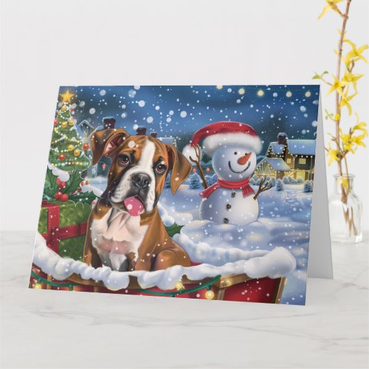 そりで雪の中のボクサー犬 クリスマス カード (黄色い花)