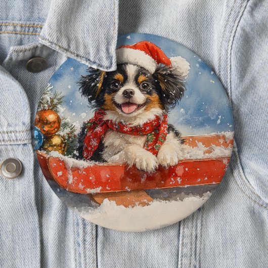 そりで雪遊びするジャパニーズ・チン クリスマス 缶バッジ (インサイチュ)