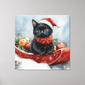 そりで雪遊びする黒猫 クリスマスデザイン キャンバスプリント (正面)