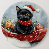 そりで雪遊びする黒猫 クリスマスデザイン 缶バッジ (正面)