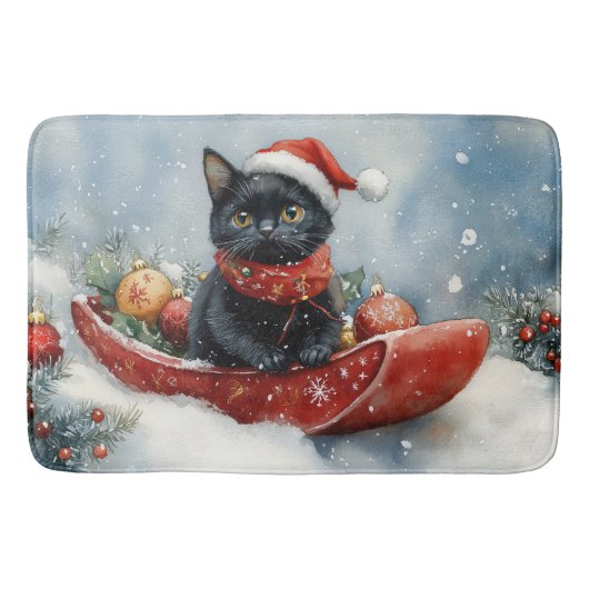 そりで雪遊びする黒猫 雪降るクリスマス バスマット (正面)