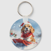 そりに乗ったビーグル犬 雪を降らせて クリスマス キーホルダー (裏面)