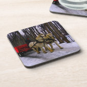 そりに乗って雪を拾う コースター (左側)