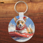 そりに入ったバセンジー犬 雪を降らせて クリスマス キーホルダー (裏面)