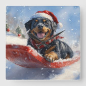 そりに入ったロットワイラー犬 雪を降らせて クリスマス スクエア壁時計 (正面)
