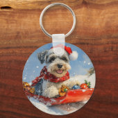 そりの中のシュナウザー犬 雪を降らせて クリスマス キーホルダー (正面)