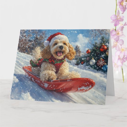 そり犬の可愛いコッカー・スパニエル 雪を降らせて クリスマス カード (蘭)