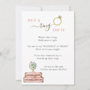 それに指輪をはめて 旅行をテーマにした結婚前お披露目ゲーム 招待状