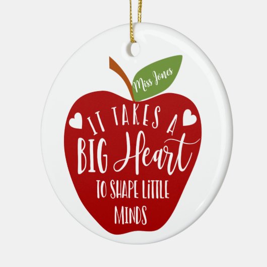 それは大きなハート先生のリンゴのクリスマスプレゼントを取る セラミックオーナメント (左)