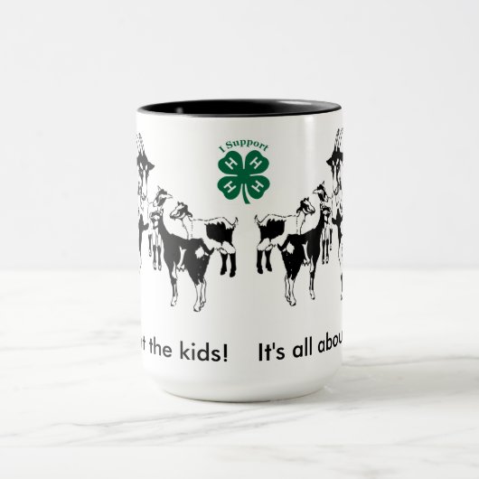 それは子供について完全にあります! 子供を持つヤギは4-Hを襲います マグカップ (中央)