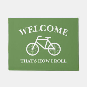 それは私がおもしろいな自転車の歓迎のドア・マットをいかに転がるかで ドアマット