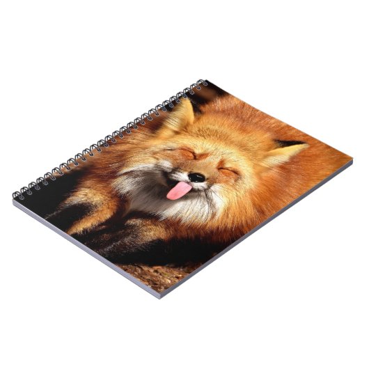 それを付けているおもしろいなキツネは舌です ノートブック (左側)