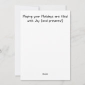 たくさんのおもしろいおもちゃを持つゴールデンレトリバーのクリスマス シーズンカード (裏面)