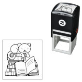 たくさんの本に乗ったかわいい猫|過去記事 セルフインキングスタンプ (インサイチュ)