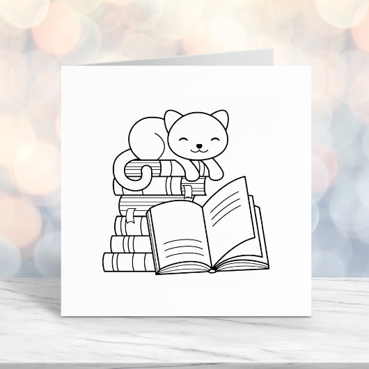 たくさんの本に乗ったかわいい猫|過去記事 セルフインキングスタンプ