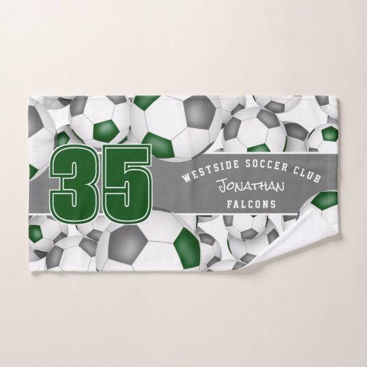 たくさんの緑のグレーチームがサッカーボールを彩る ハンドタオル (ハンドタオル)