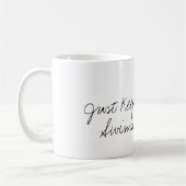 "ちょうど水泳"の金魚のコーヒー・マグ保って下さい コーヒーマグカップ (左)