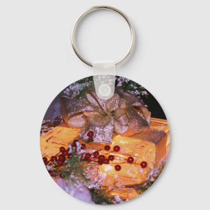 つけられたギフトの金ゴールドの弓クリスマスの休日Keychain キーホルダー