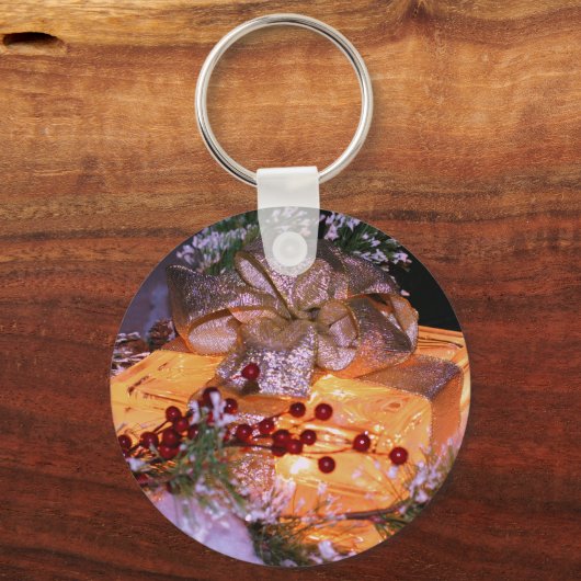 つけられたギフトの金ゴールドの弓クリスマスの休日Keychain キーホルダー (正面)