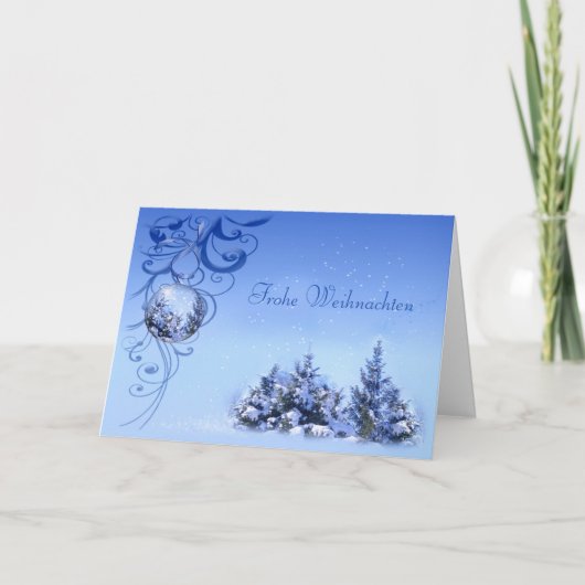 つまらないものおよび雪が多い松の木のドイツ人のクリスマス シーズンカード (正面)