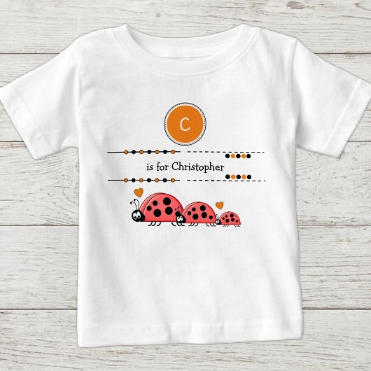 てんとう虫 名前 黒 オレンジ ベビーTシャツ