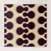 とげのある球形の形状、茶色の陰影のパターン。 ジグソーパズル (縦)