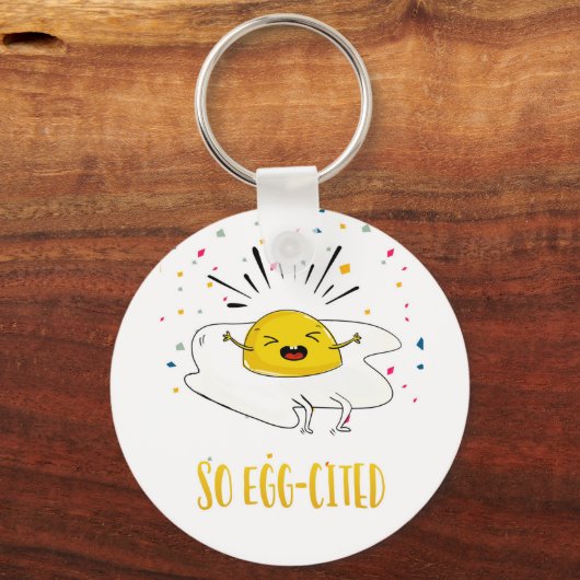 とても興奮した新しい仕事の新しい家の卵 キーホルダー (正面)