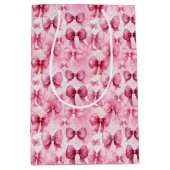 とエレガントピンクお洒落コケット弓リボン ミディアムペーパーバッグ (正面)